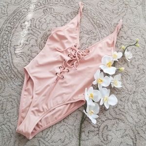 Mauve one piece bathing suit